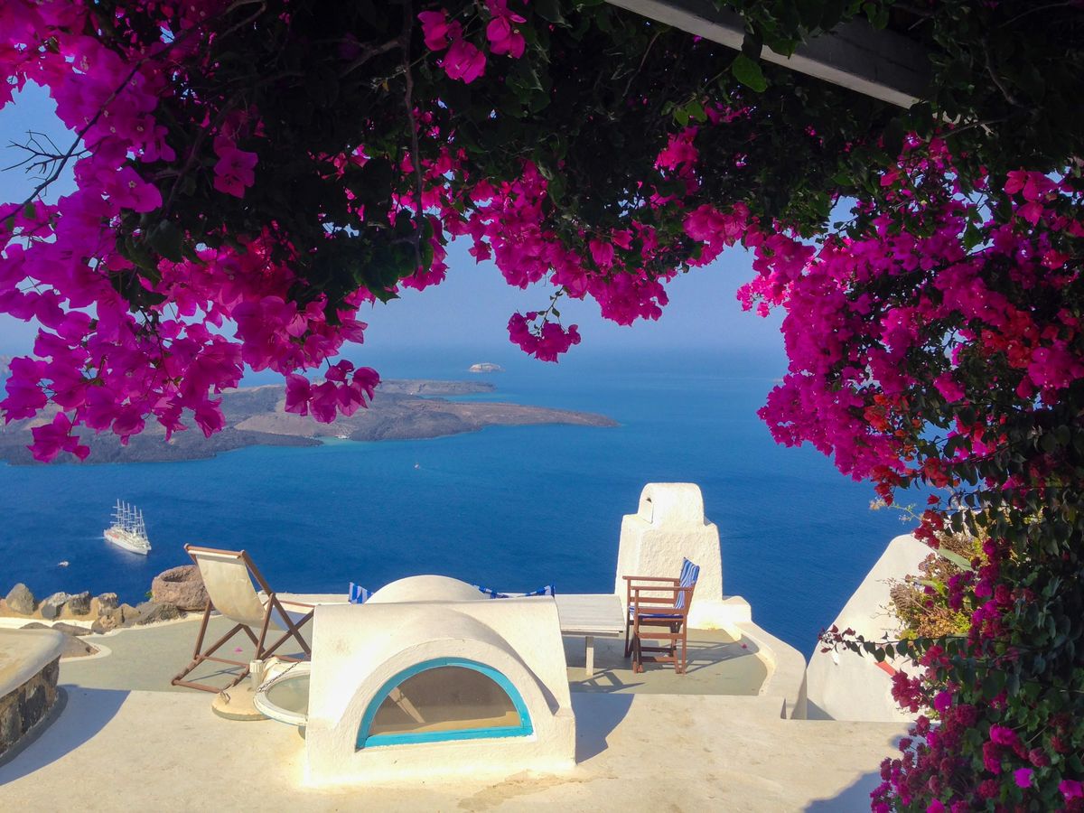A sunny Mediterranean terrace overlooking the sea in a warm climate