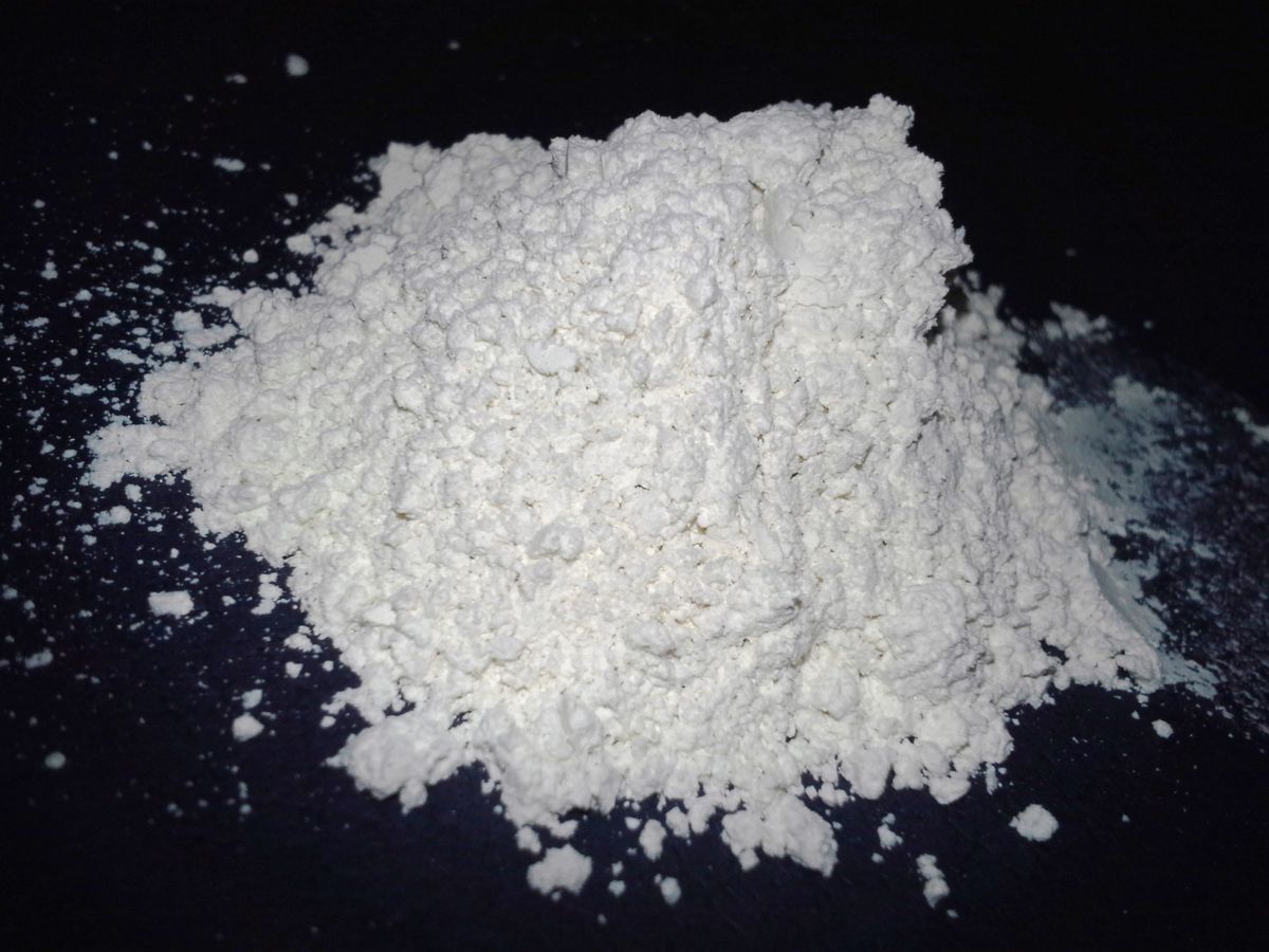 A pile of white diatomaceous earth powder, a natural insect-control dust
