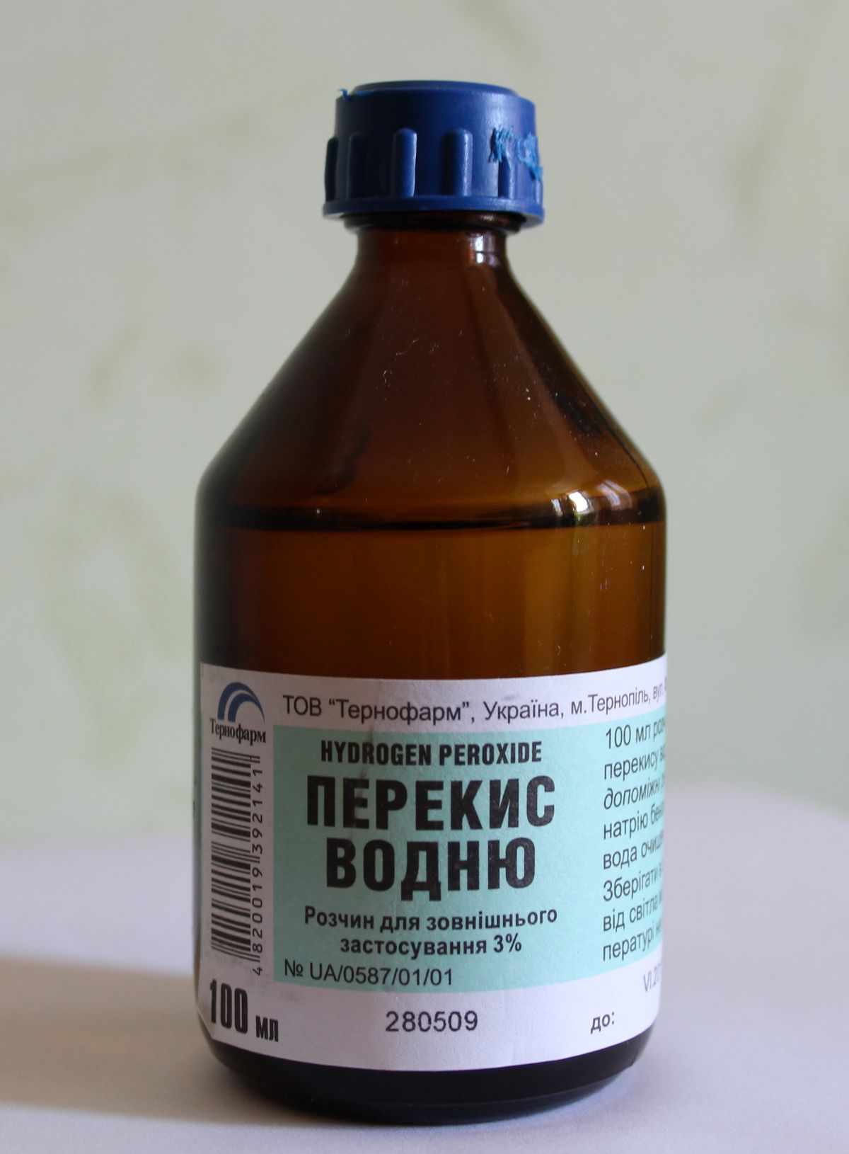 A bottle of hydrogen peroxide, a common household disinfectant
